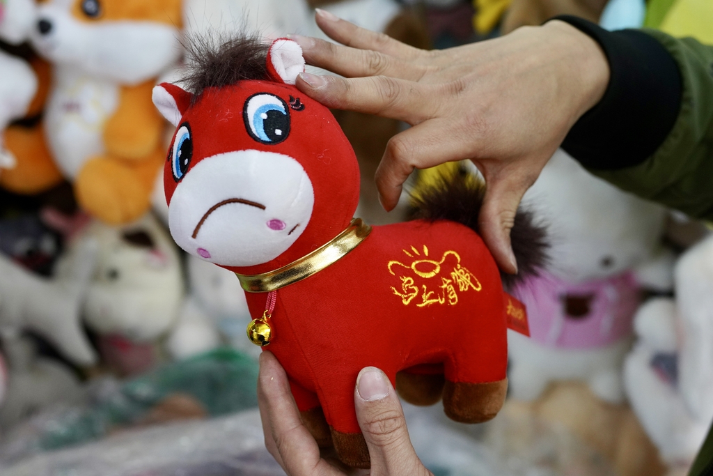 The manufacturer holds up a 