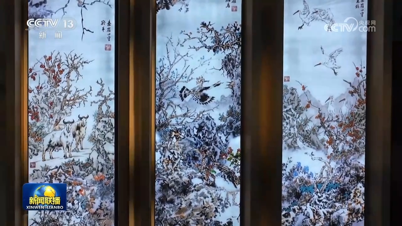 Chinese paintings of takins (L), common hoopoes (C) and crested ibises displayed in the main hall of China's Qinling Station in Antarctica. /CMG