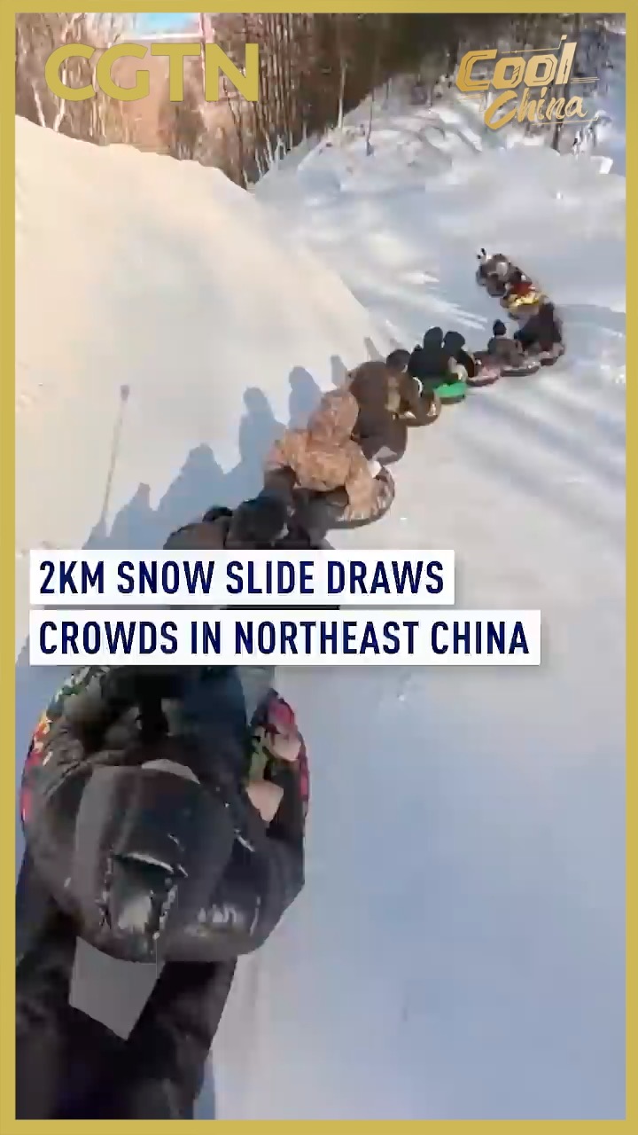 2km snow slide draws crowds in northeast China