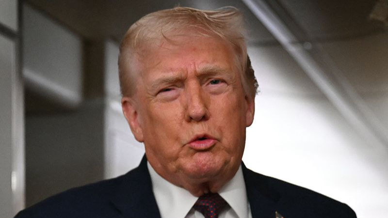 U.S. President Donald Trump speaks to the press aboard Air Force One, U.S., January 11, 2026. /VCG