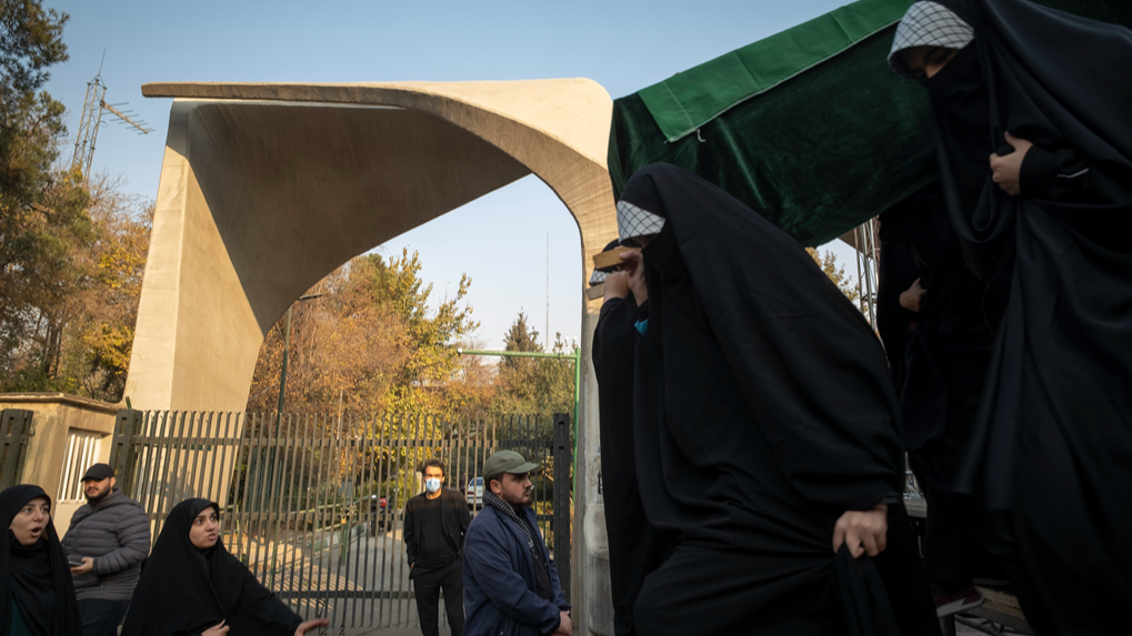 Live: Mourners hold funeral procession outside Tehran University