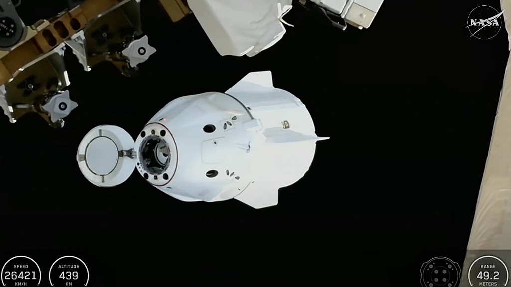 The SpaceX Dragon capsule departing from the International Space Station shortly after undocking with four NASA Crew-11 members inside, January 14, 2026. /VCG