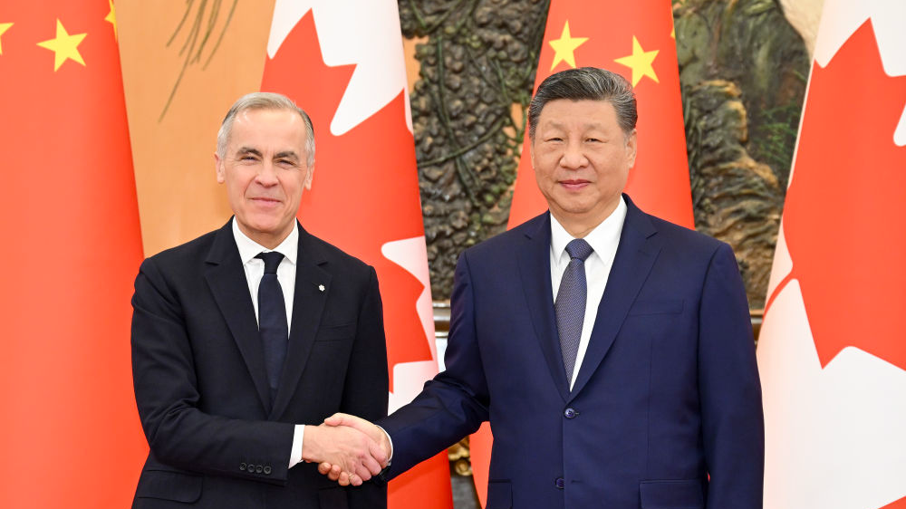 Chinese President Xi Jinping (R) shakes hands with Canadian Prime Minister Mark Carney in Beijing, China, January 16, 2026. /Xinhua