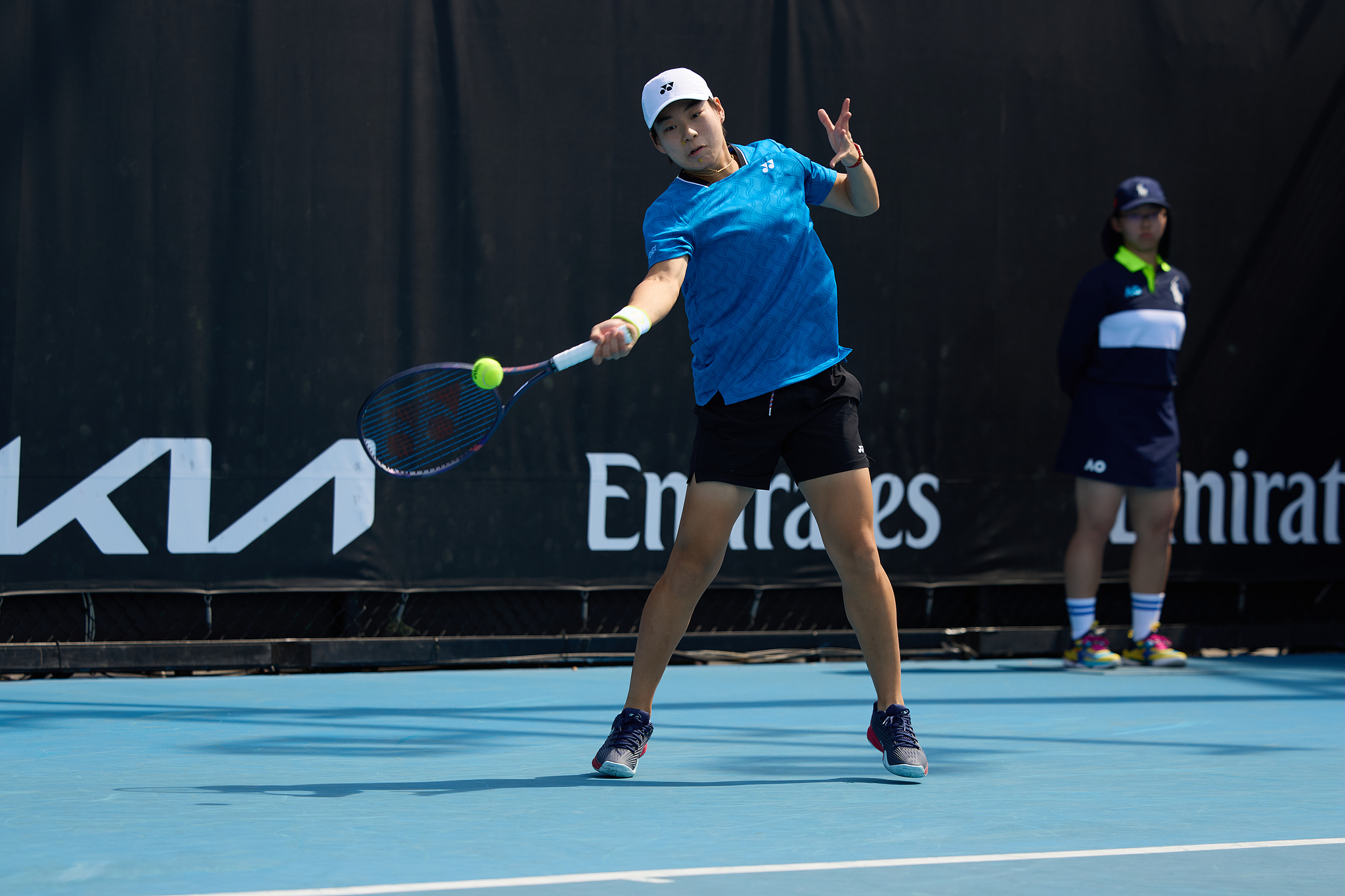 Bai Zhuoxuan of China hits a shot in the women's singles third-round match against Darja Vidmanova of the Czech Republic in the Australian Open qualifying event at Melbourne Park in Melbourne, Australia, January 15, 2026. /VCG
