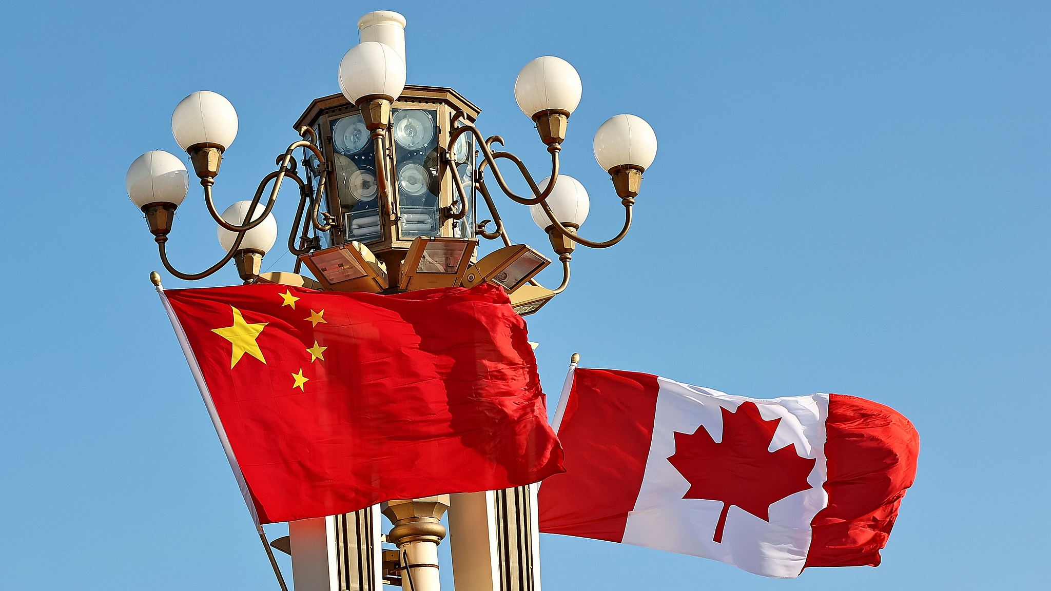 The national flags of China and Canada in front of Tiananmen Square in Beijing, China, January 16, 2026. /CFP