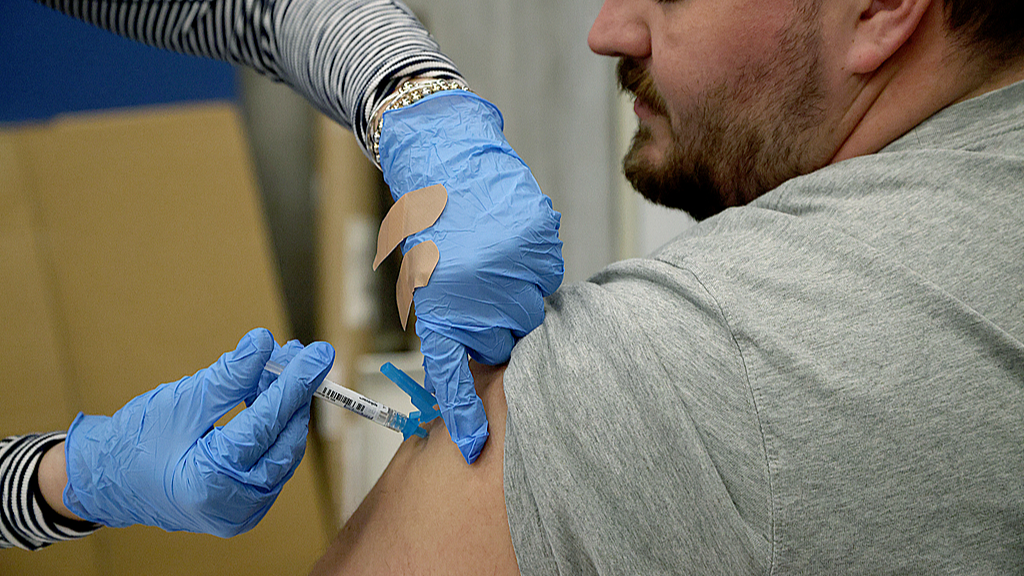 A man receives a vaccine at Boston City Hall, Boston, Massachusetts, U.S., January 7, 2026. /VCG