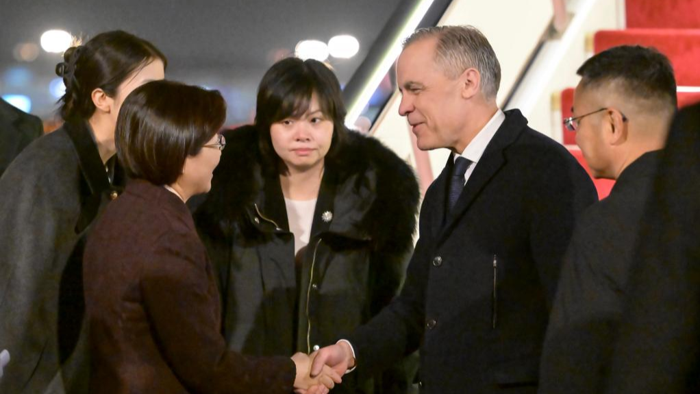 Canadian Prime Minister Mark Carney (R) arrives in Beijing, capital of China, January 14, 2026. /Xinhua
