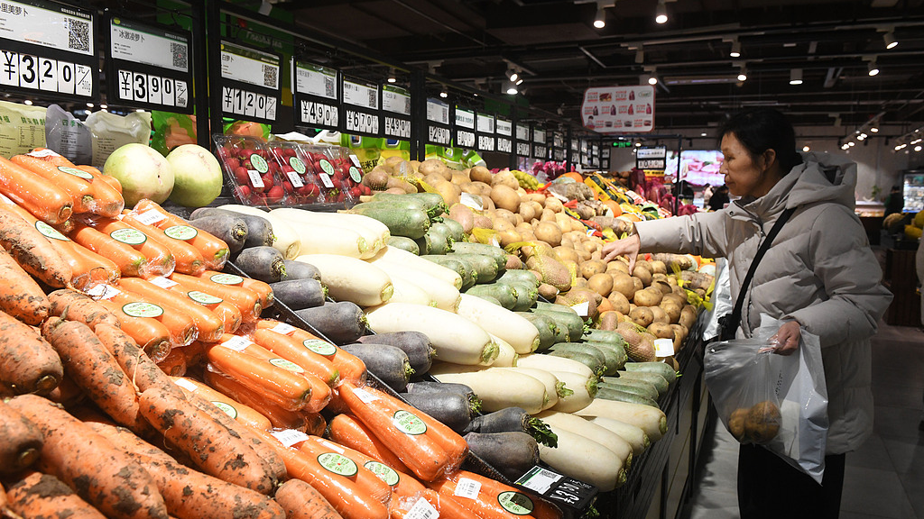 Consumers shopping for vegetables at a supermarket in Shijiazhuang, Hebei Province, China, on January 19, 2026. /VCG
