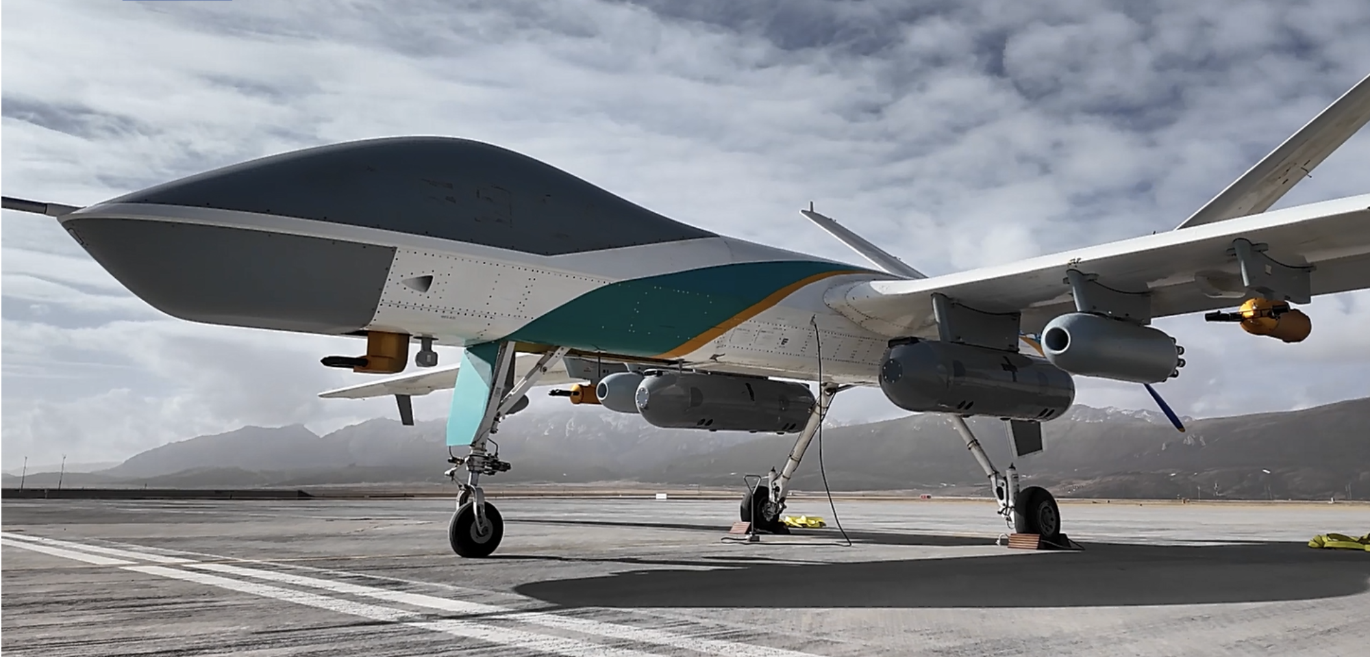 China's independently developed Wing Loong artificial weather modification UAV successfully carried out a precipitation enhancement (snow) operation in the Three-River-Source region on April 22, 2025. /CMG