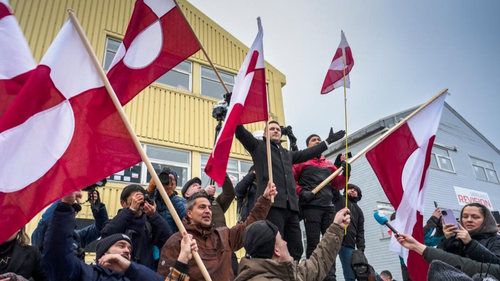 Greenland's Prime Minister Jens-Frederik Nielsen (L, on the snow) is seen during a demonstration against U.S. actions and remarks suggesting control over Greenland in Nuuk, capital of Greenland, an autonomous territory of Denmark, January 17, 2026. /Xinhua
