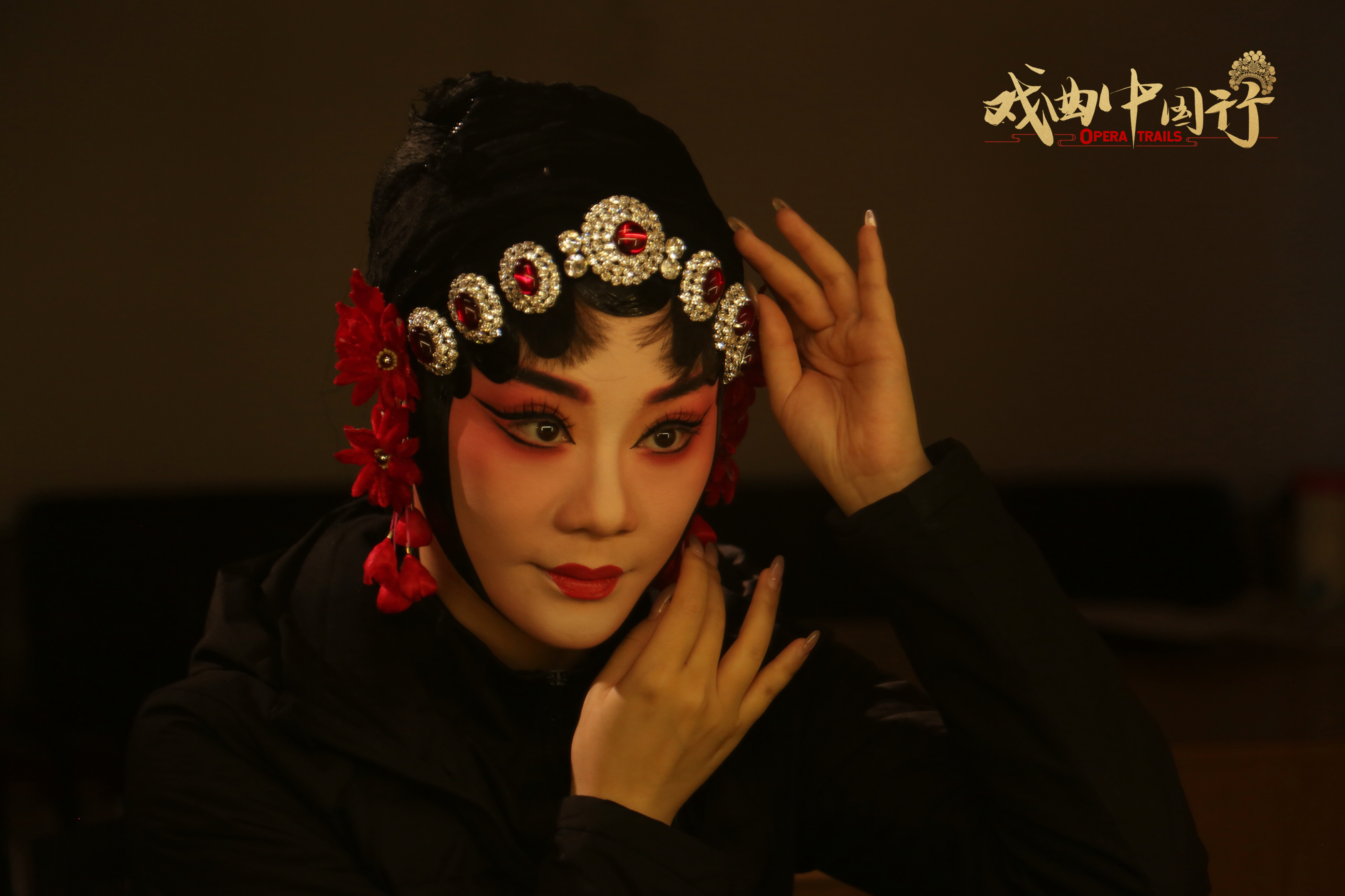 Cao Weizhi does make-up for Xiang opera, Changsha City, central China's Hunan Province, December 4, 2025. /CGTN