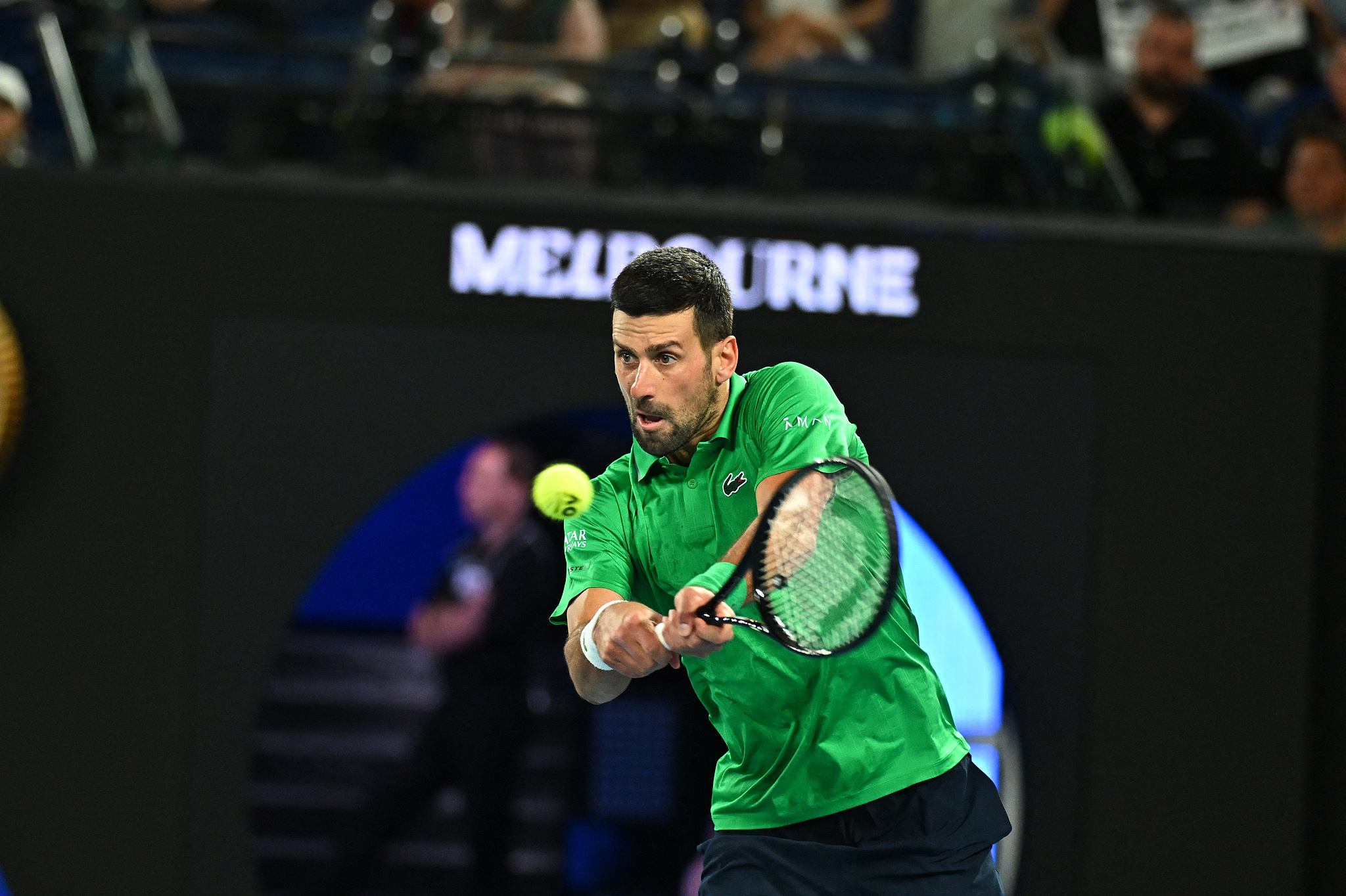 Serbia's Novak Djokovic hits a shot in the men's singles first-round match against Spain's Pedro Martinez at the Australian Open at Melbourne Park in Melbourne, Australia, January 19, 2026. /VCG