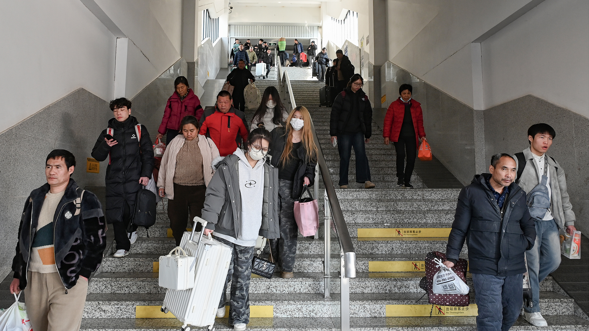 People enter a train station in Hangzhou, the capital of China's Zhejiang Province, January 8, 2026. /VCG

