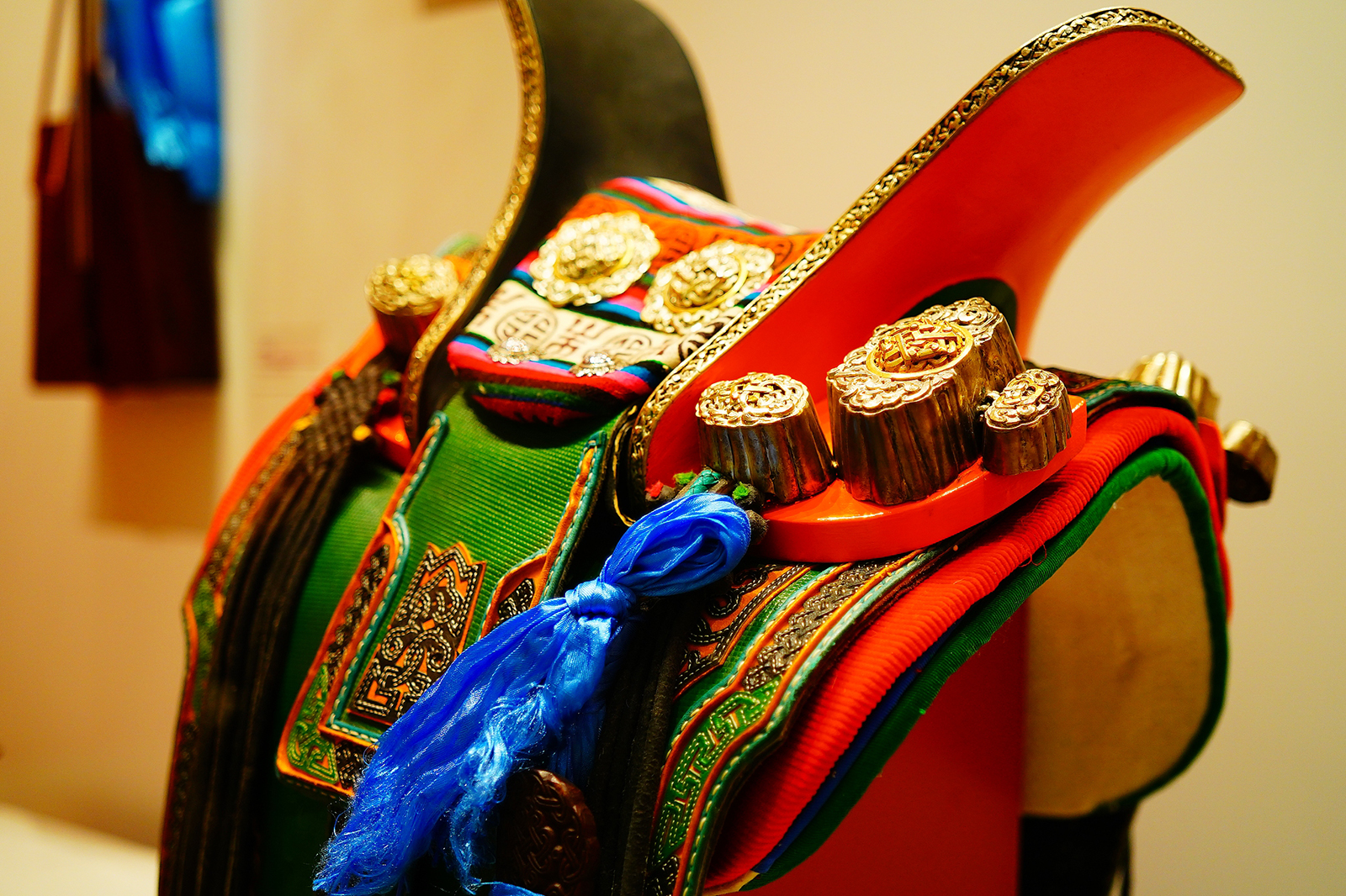 A saddle crafted using intangible cultural heritage techniques is seen on display at a Spring Festival-themed exhibition at the Chinese Traditional Culture Museum in Beijing on January 20, 2026. /VCG