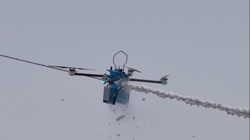 Robots help secure power veins on central China's icy peaks