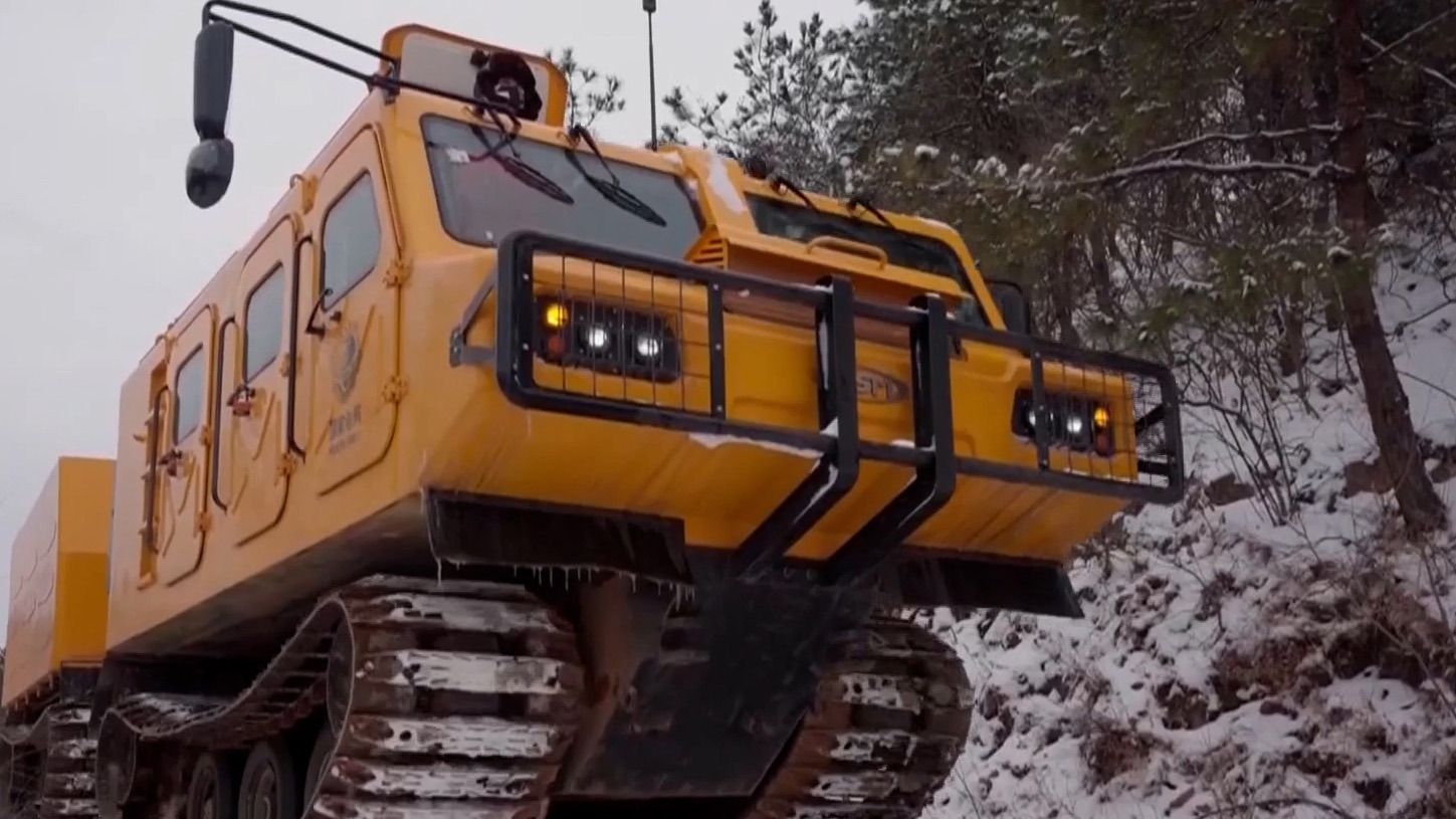 A Python all-terrain crawler climbs the Niuji Mountain near Suizhou City, central China's Hubei Province, January 20, 2026. /CMG
