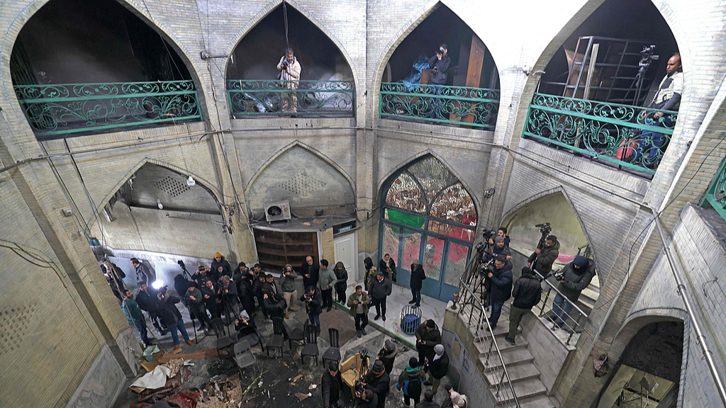 This photograph taken during a tour for foreign media shows media representatives visiting the Al-Aqsa Mosque that was damaged during recent public protests in Tehran, Iran, January 21, 2026. /VCG