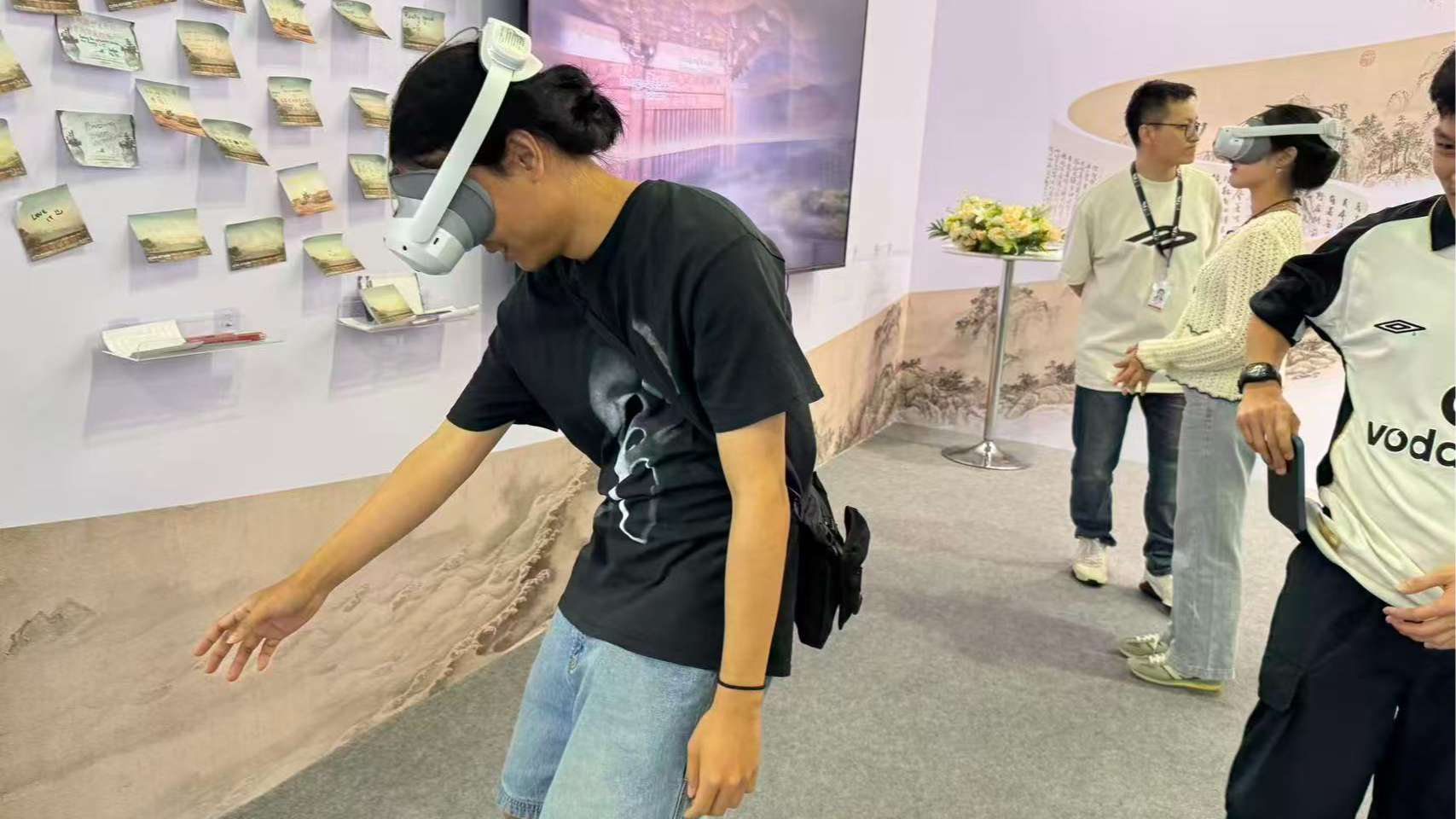 Art enthusiasts explore digital exhibitions of the CGTN Art Series at ART SG in Singapore, January 23, 2026. /CGTN