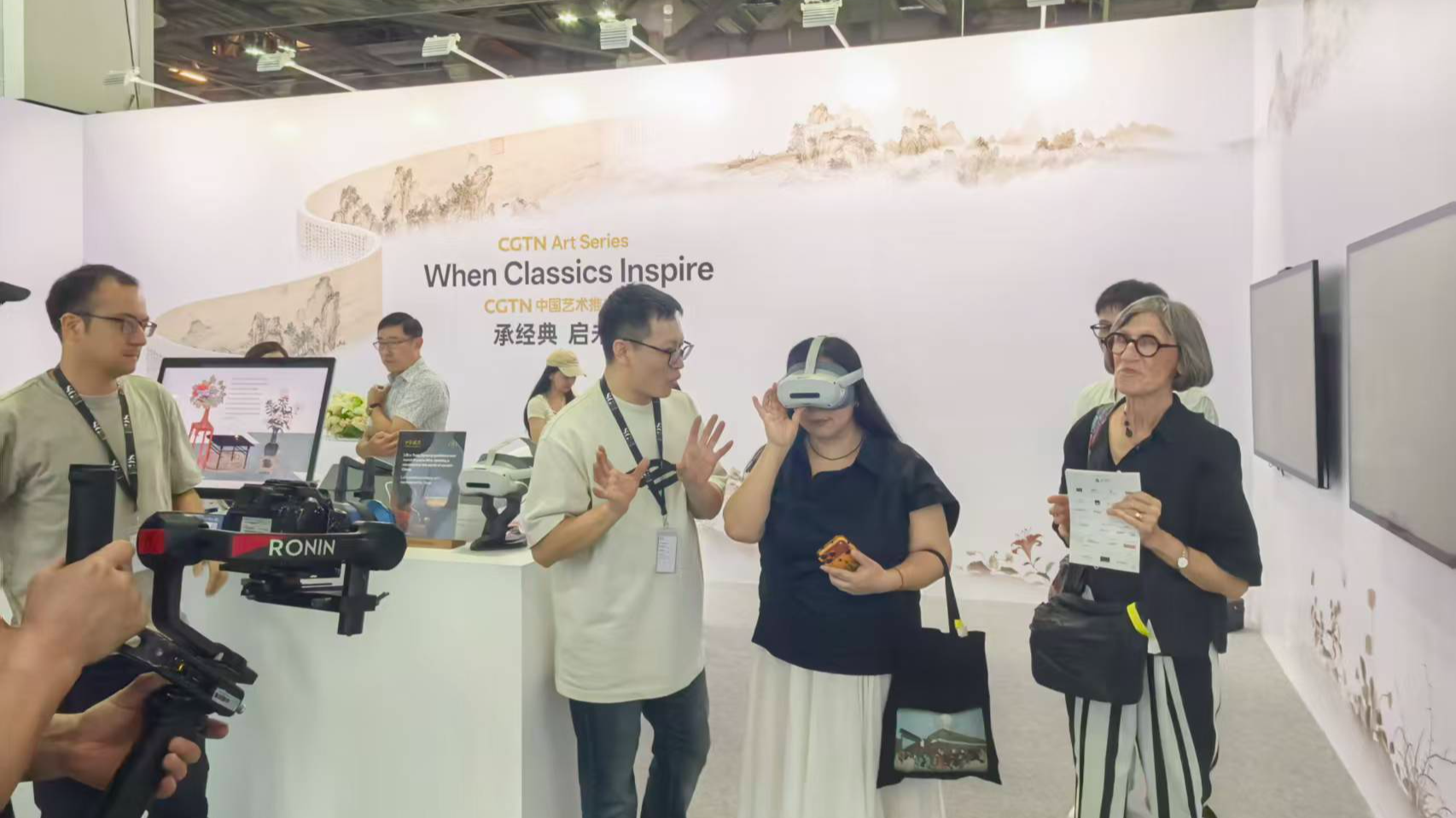 Art enthusiasts explore digital exhibitions of the CGTN Art Series at ART SG in Singapore, January 23, 2026. /CGTN