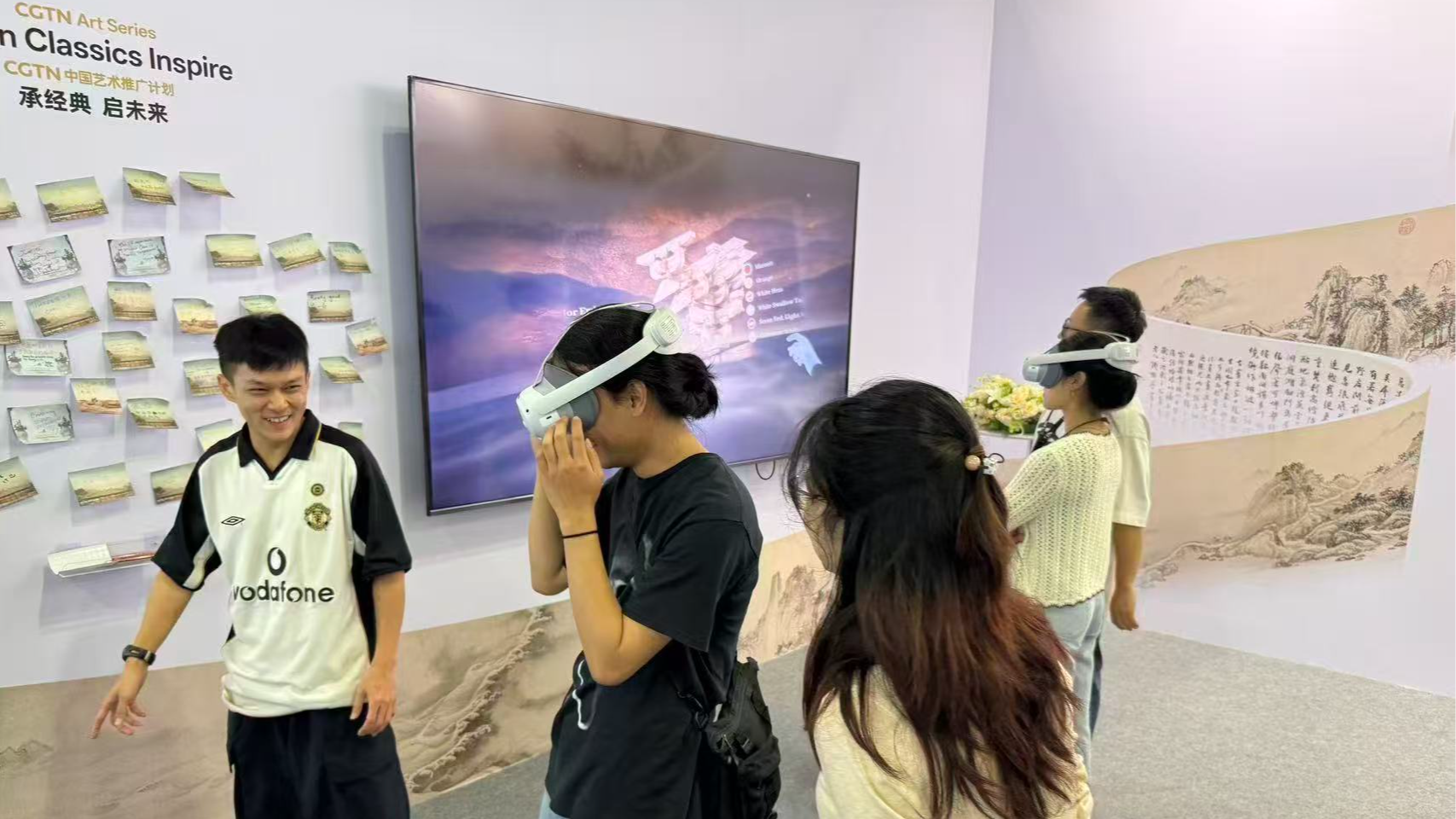 Art enthusiasts explore digital exhibitions of the CGTN Art Series at ART SG in Singapore, January 23, 2026. /CGTN