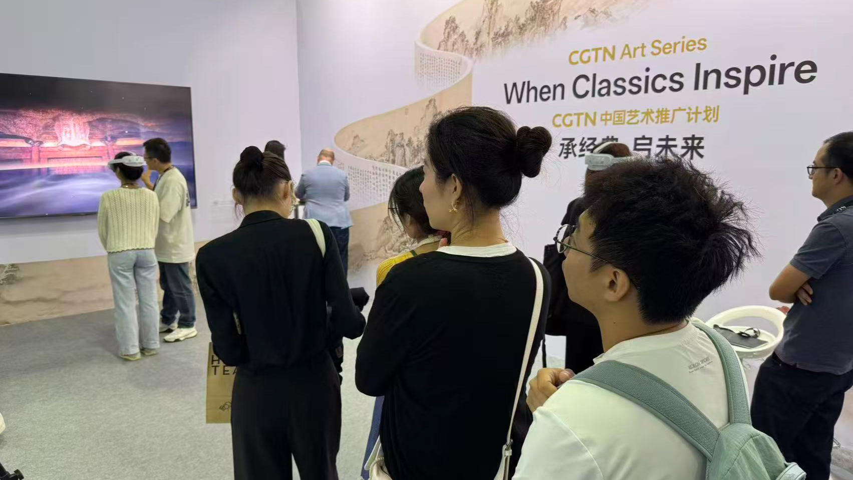 Art enthusiasts explore digital exhibitions of the CGTN Art Series at ART SG in Singapore, January 23, 2026. /CGTN