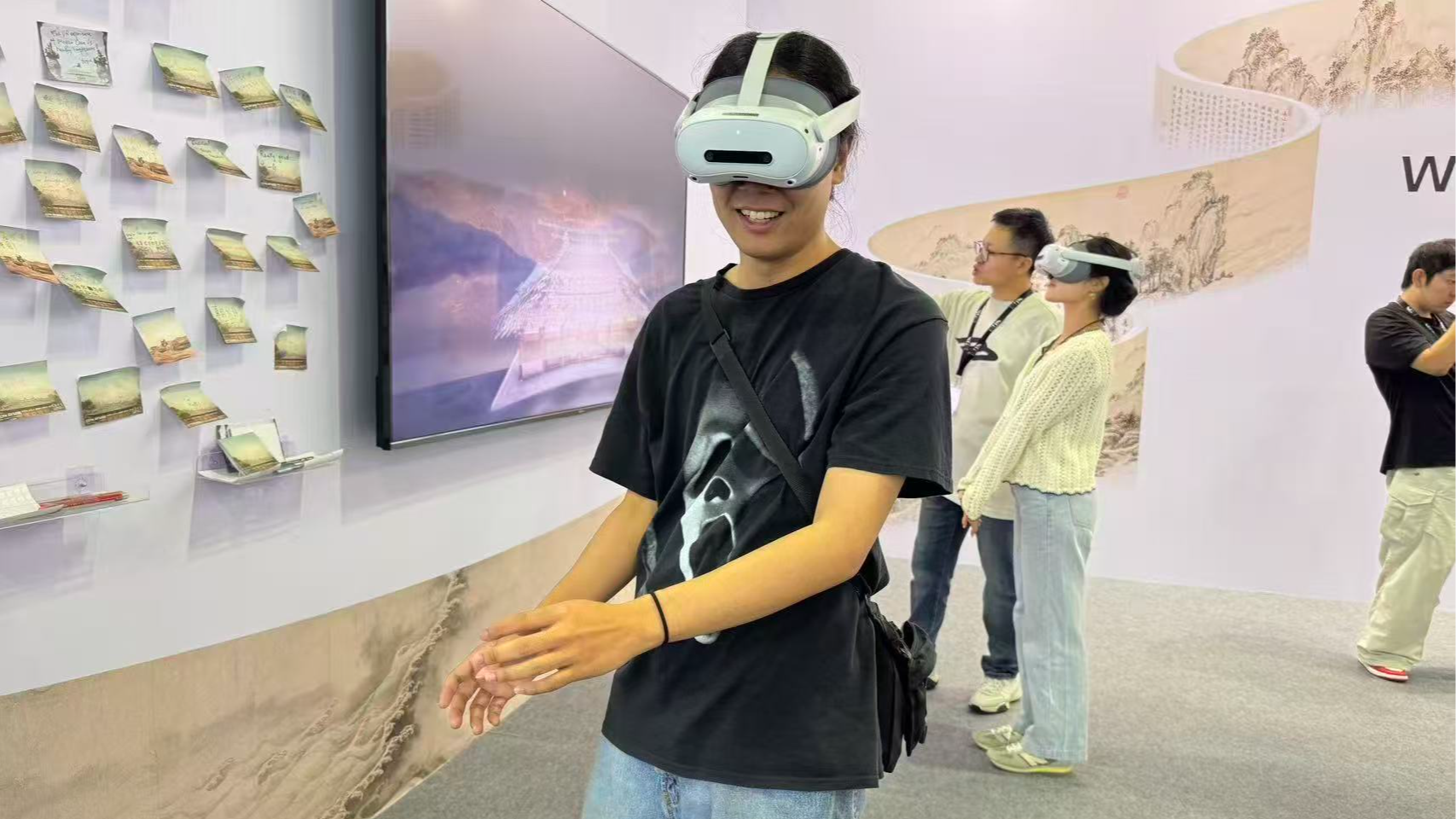 Art enthusiasts explore digital exhibitions of the CGTN Art Series at ART SG in Singapore, January 23, 2026. /CGTN