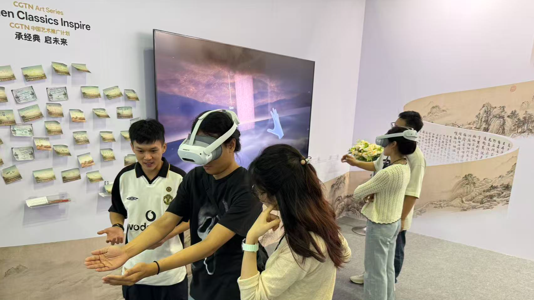 Art enthusiasts explore digital exhibitions of the CGTN Art Series at ART SG in Singapore, January 23, 2026. /CGTN