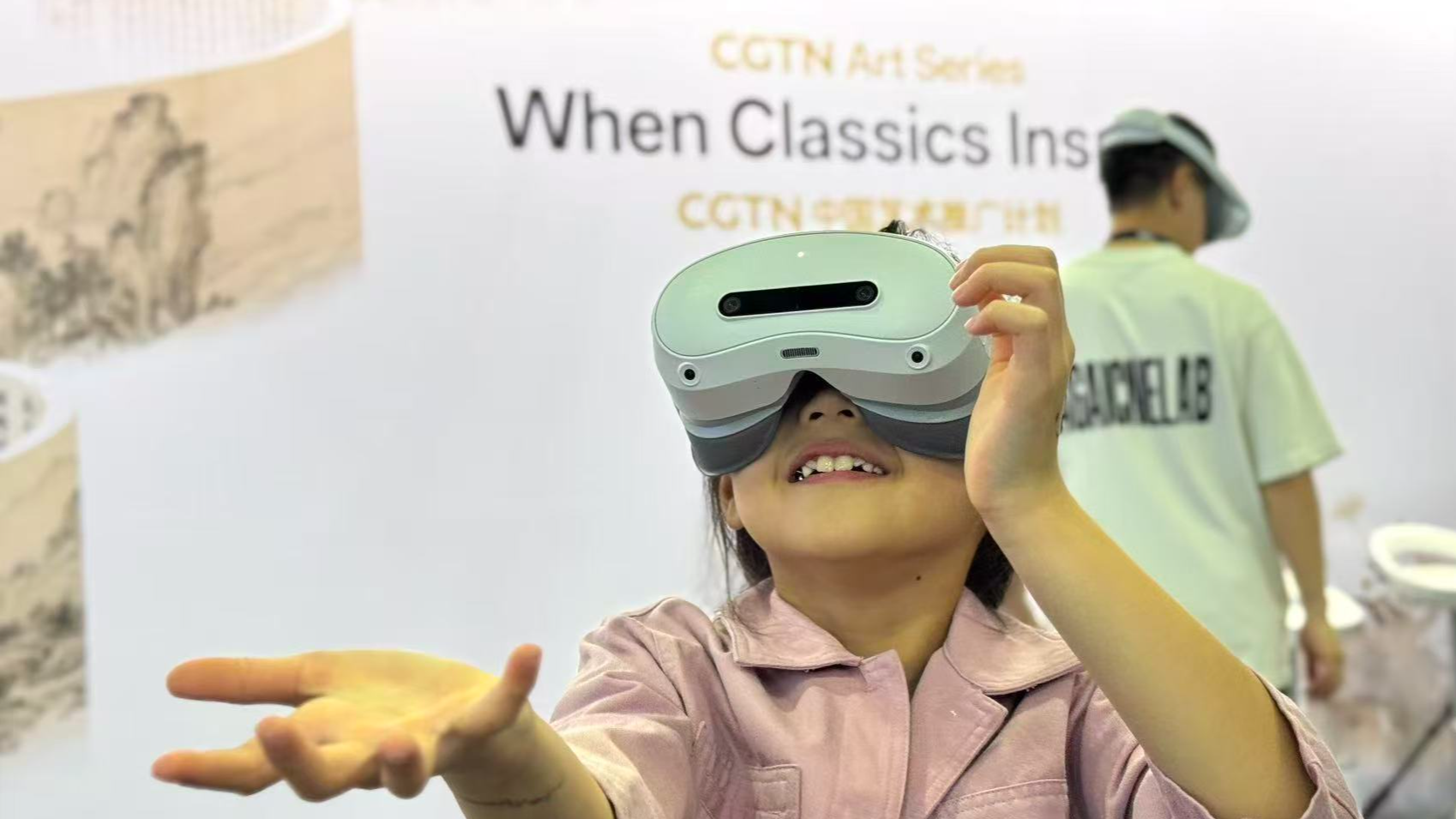 Art enthusiasts explore digital exhibitions of the CGTN Art Series at ART SG in Singapore, January 23, 2026. /CGTN