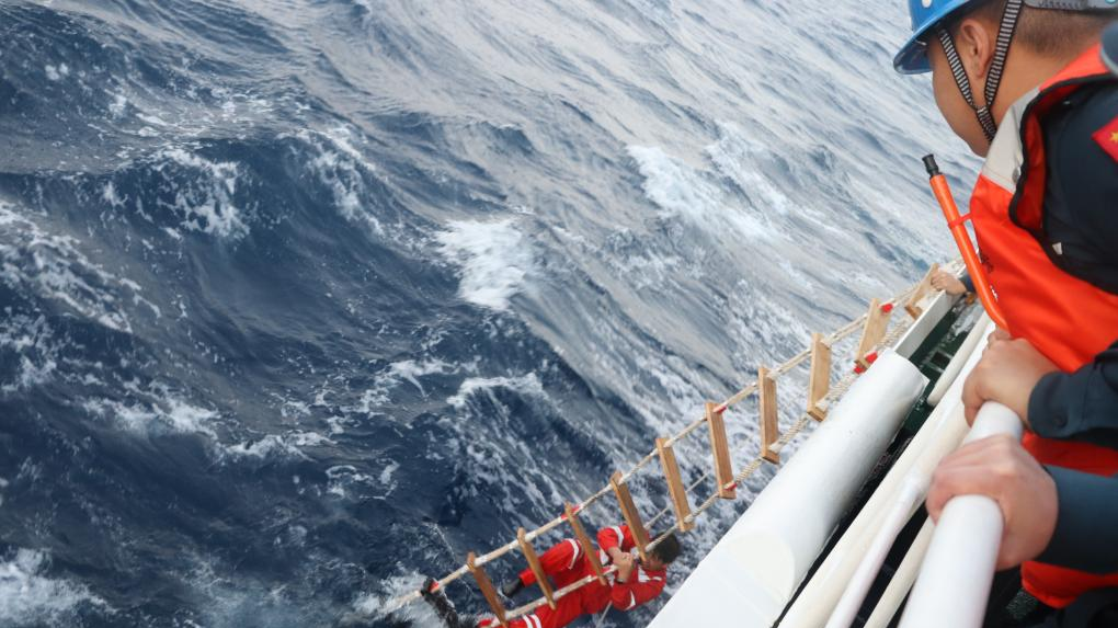 Members of the China Coast Guard carry out a rescue operation after a foreign cargo ship capsized in the territorial waters of south China's Huangyan Dao, on January 23, 2026. /China Coast Guard