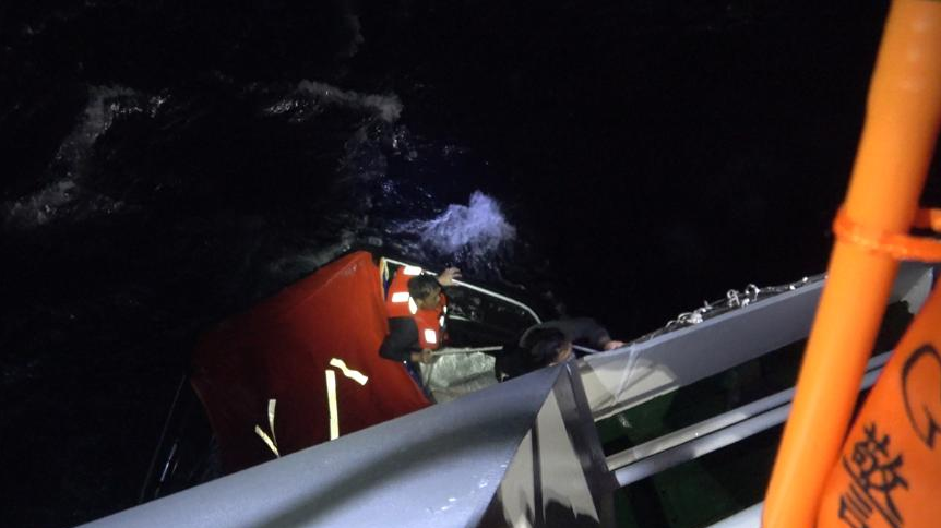 Members of the China Coast Guard carry out a rescue operation after a foreign cargo ship capsized in the territorial waters of south China's Huangyan Dao, on January 23, 2026. /China Coast Guard