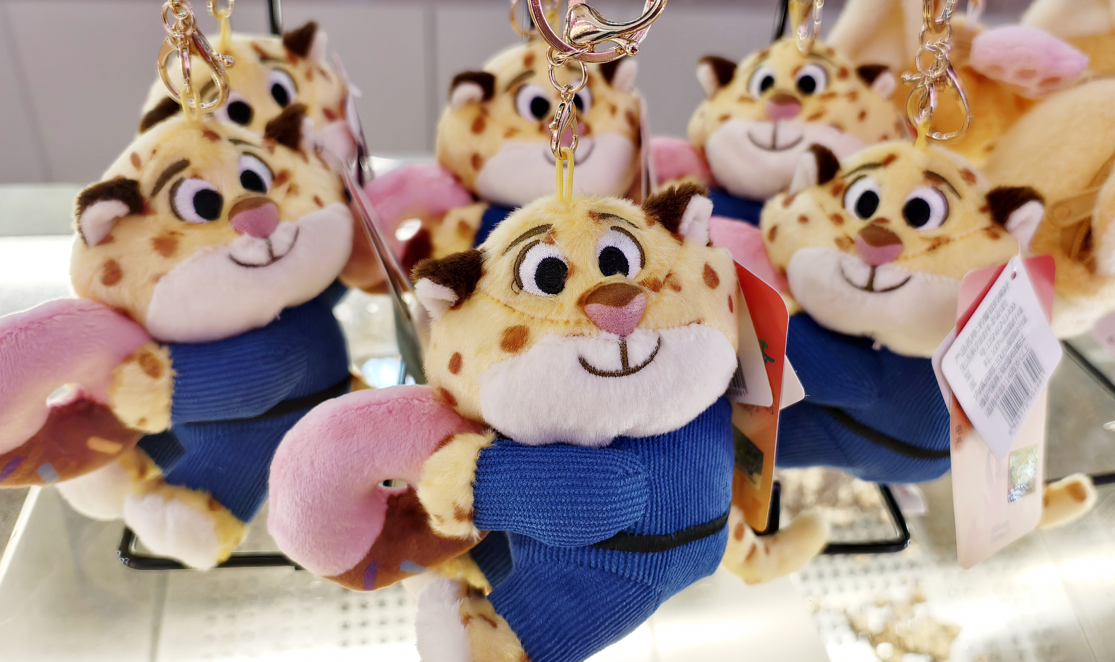 Keychain dolls based on characters from the film Zootopia are displayed in a store window in Shanghai, China, January 5, 2026. /ICphoto 