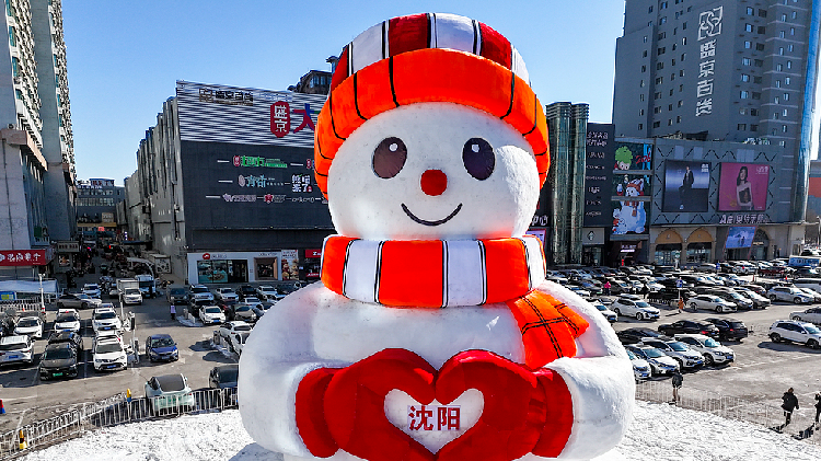 Smiling 16-meter-tall snowman brings warmth to northeast China - CGTN