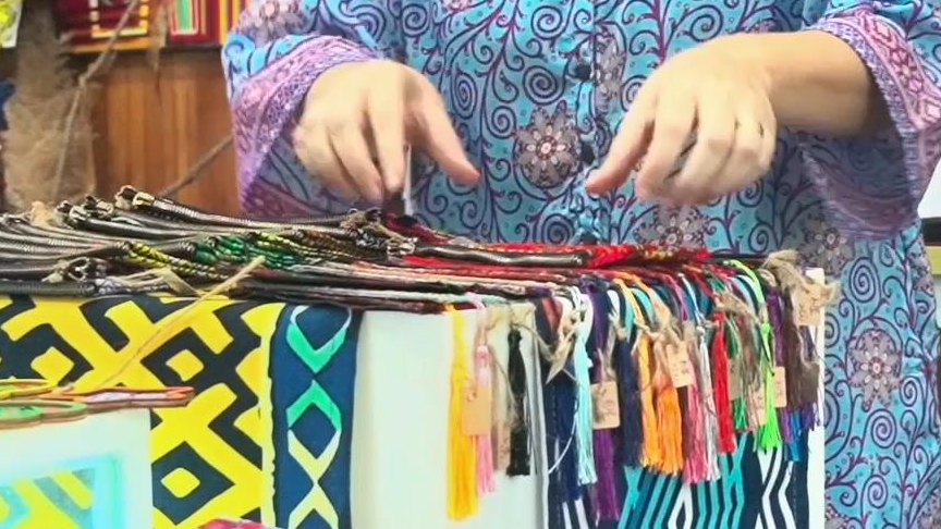 Threads of connection: An American's journey with Li brocade in Hainan