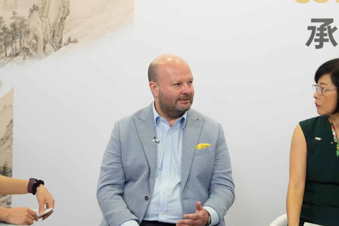 Magnus Renfrew, co-founder of ART SG, speaks during CGTN's special dialogue 