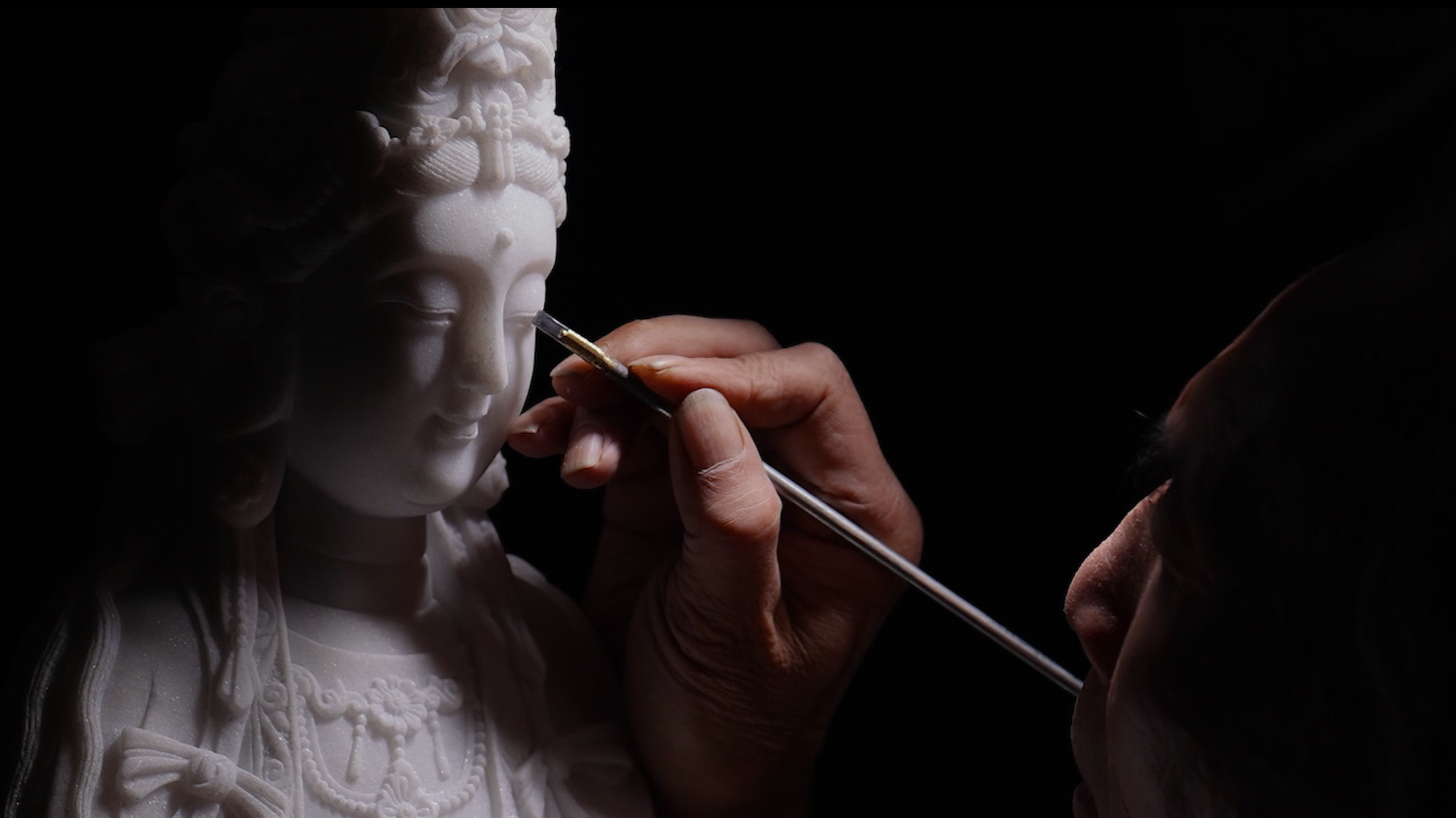 A close-up of a craft chiseled in stone