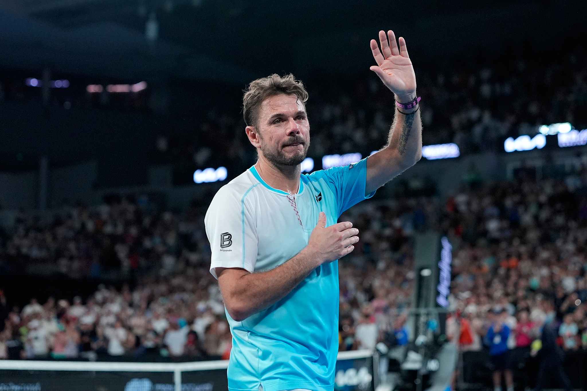 Switzerland's Stan Wawrinka waves goodbye to the crowd after losing to the USA's Taylor Fritz in the men's singles third round to mark his final match at the Australian Open in Melbourne, Australia, January 24, 2026. /VCG
