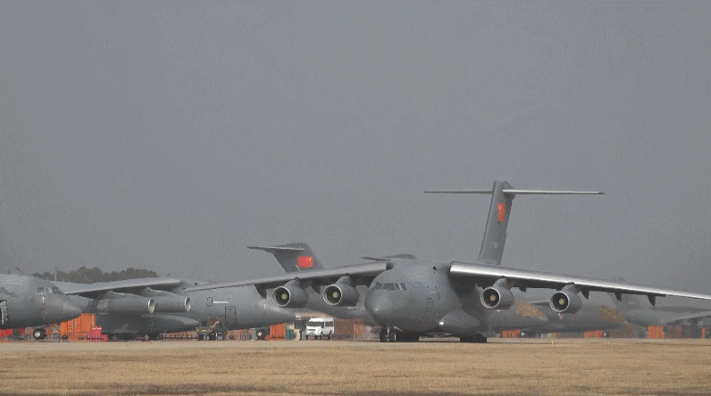 A group of Y-20 transport aircraft carry out multi-aircraft formation and long-range training in complex weather conditions and unfamiliar airspace. /CMG