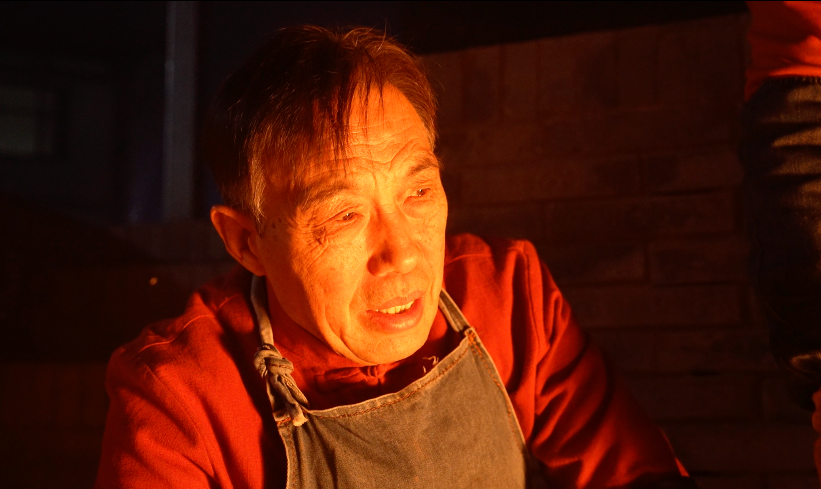 Gao Shuiwang checks fire. /CGTN