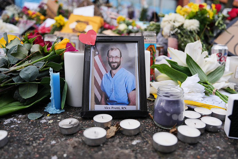 A photo of 37-year-old Alex Pretti, who was fatally shot by a U.S. Border Patrol officer over the weekend, is displayed at the shooting scene in Minneapolis, U.S., January 26, 2026. /VCG
