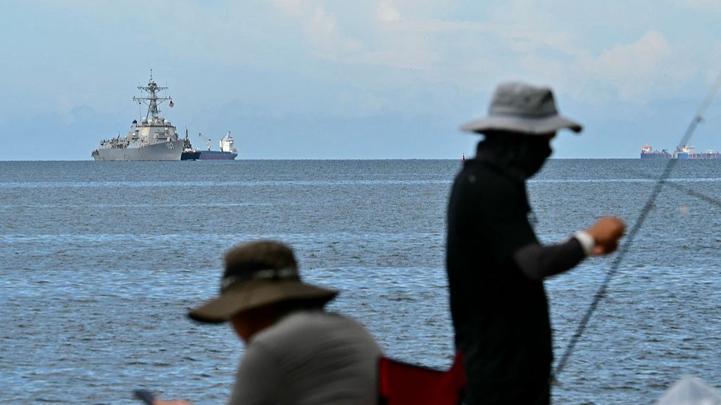 The USS Gravely warship is seen at a distance off the coast of Port of Spain, Trinidad and Tobago, October 26, 2025. /VCG