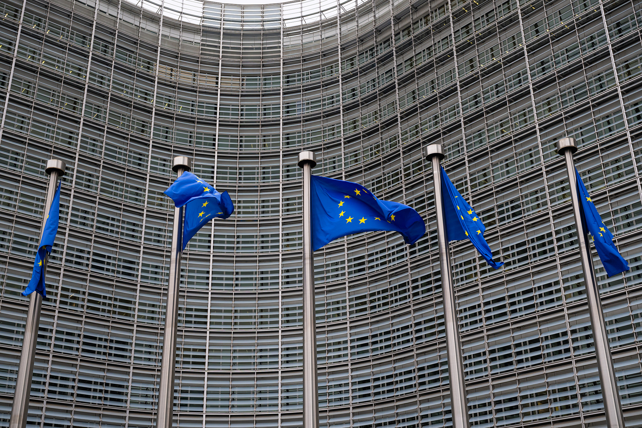 Flags of the European Union fly outside the EU headquarters in Brussels, Belgium, December 19, 2025. /VCG