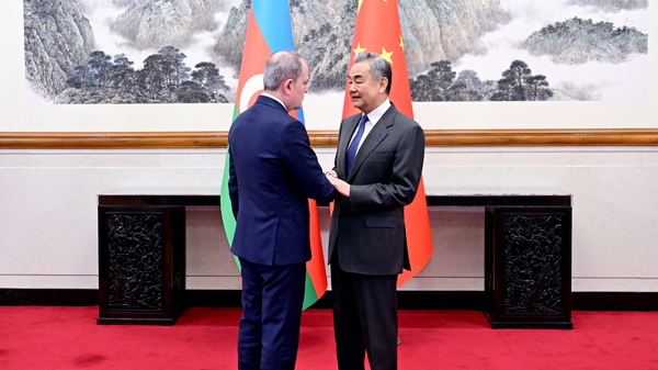 Chinese Foreign Minister Wang Yi (R), also a member of the Political Bureau of the Communist Party of China Central Committee, meets with Azerbaijan's Foreign Minister Jeyhun Bayramov in Beijing, China, January 28, 2026. /Chinese Foreign Ministry