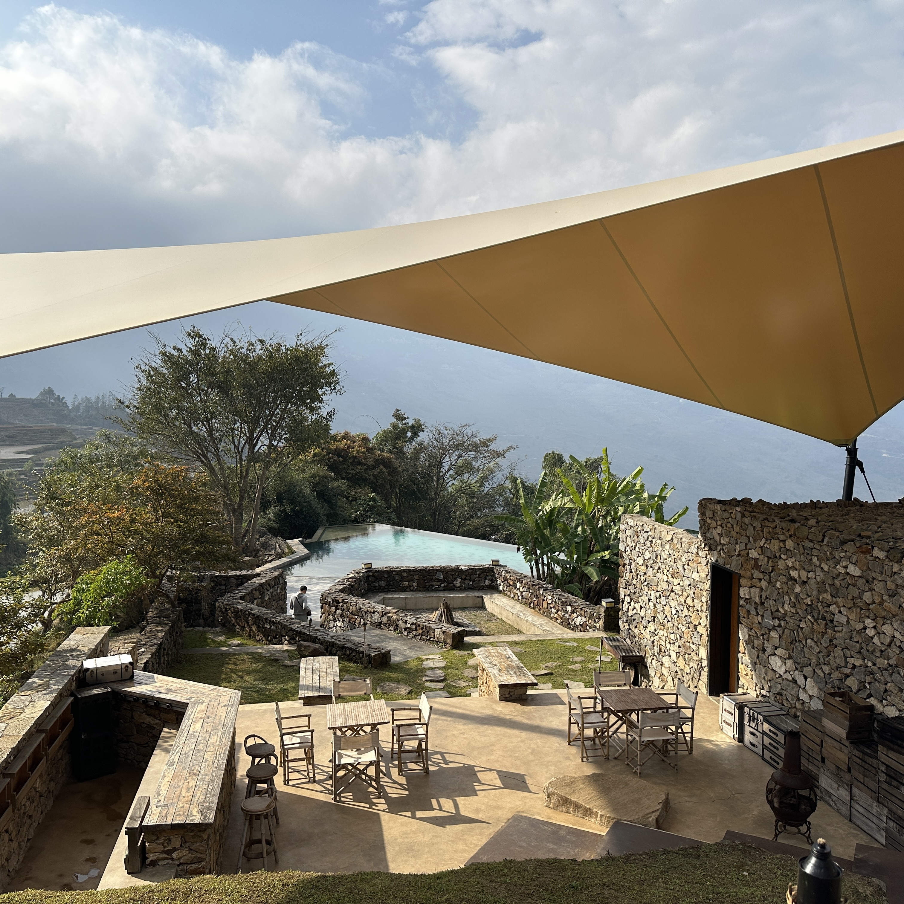 Stay in a tent built upon ancient ruins and overlook the timeless beauty of the Hani Terraces awakening in the morning light. /CGTN