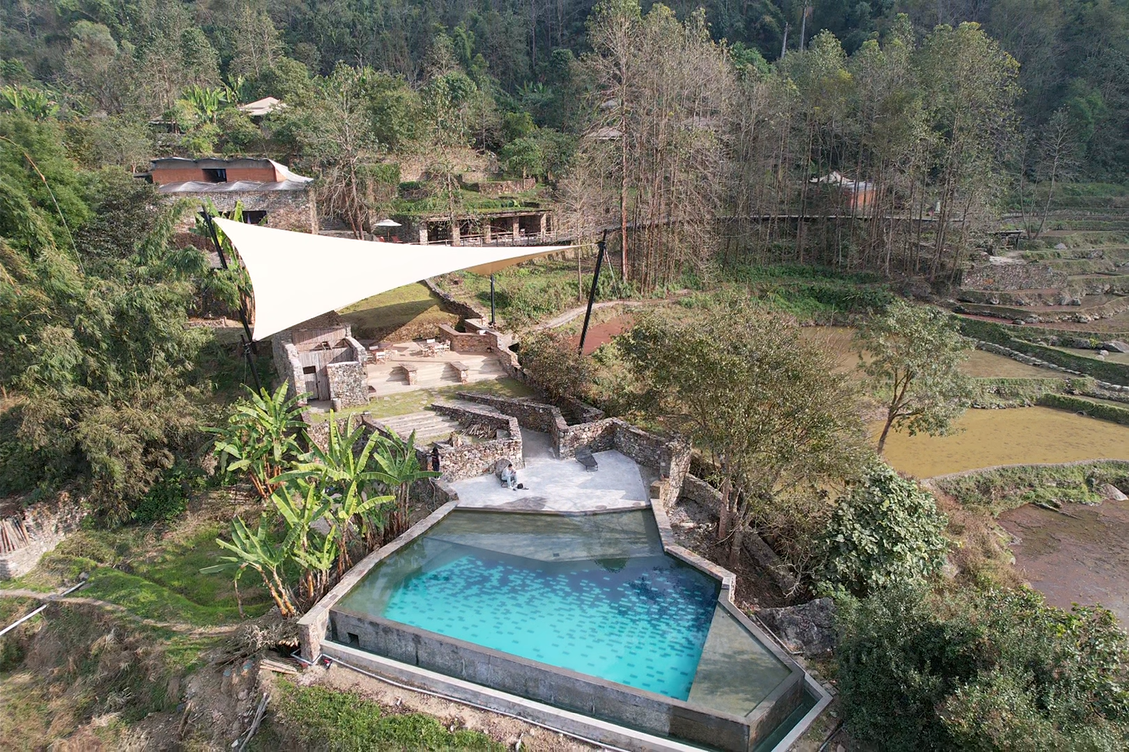 Stay in a tent built upon ancient ruins and overlook the timeless beauty of the Hani Terraces awakening in the morning light. /CGTN