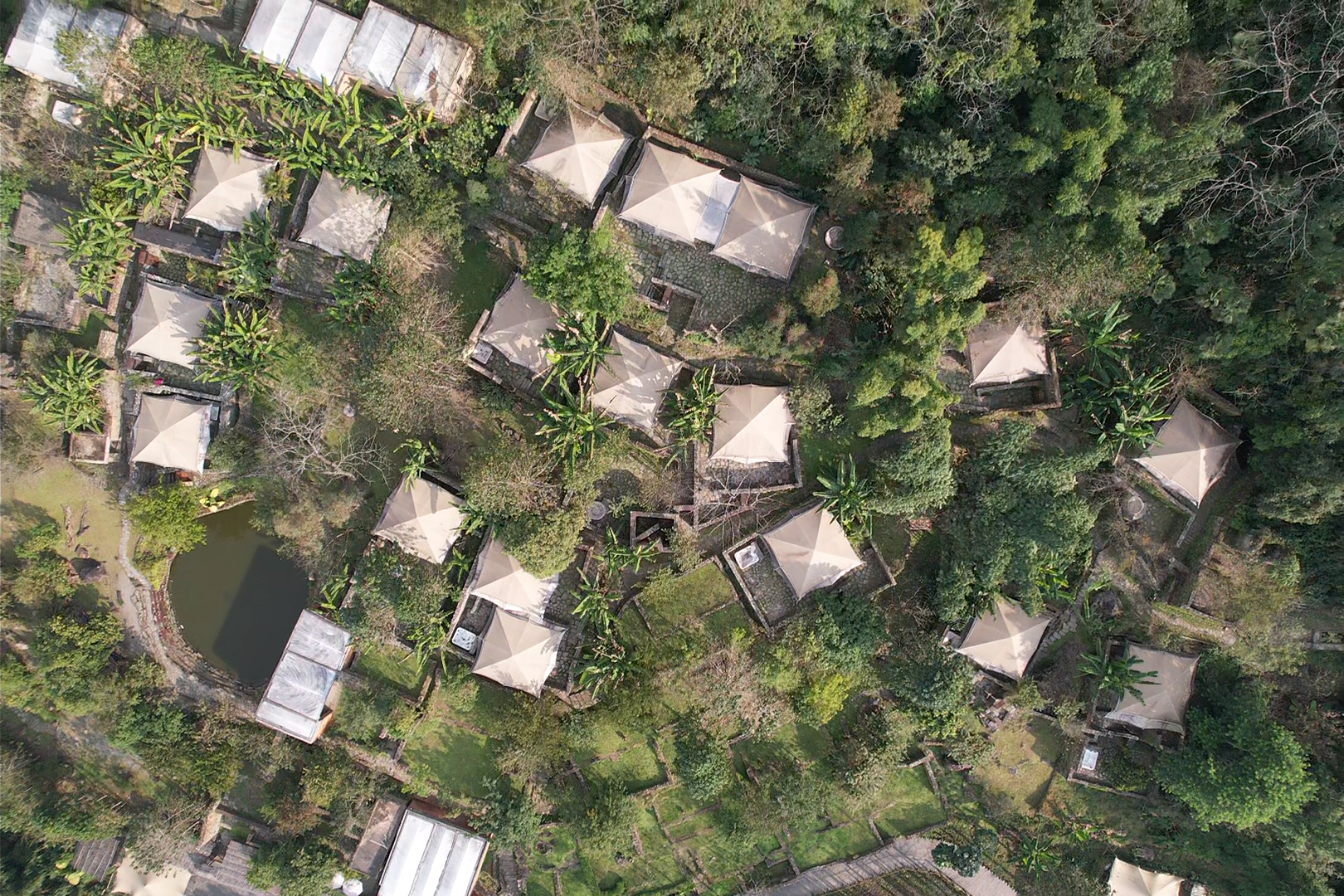 Stay in a tent built upon ancient ruins and overlook the timeless beauty of the Hani Terraces awakening in the morning light. /CGTN