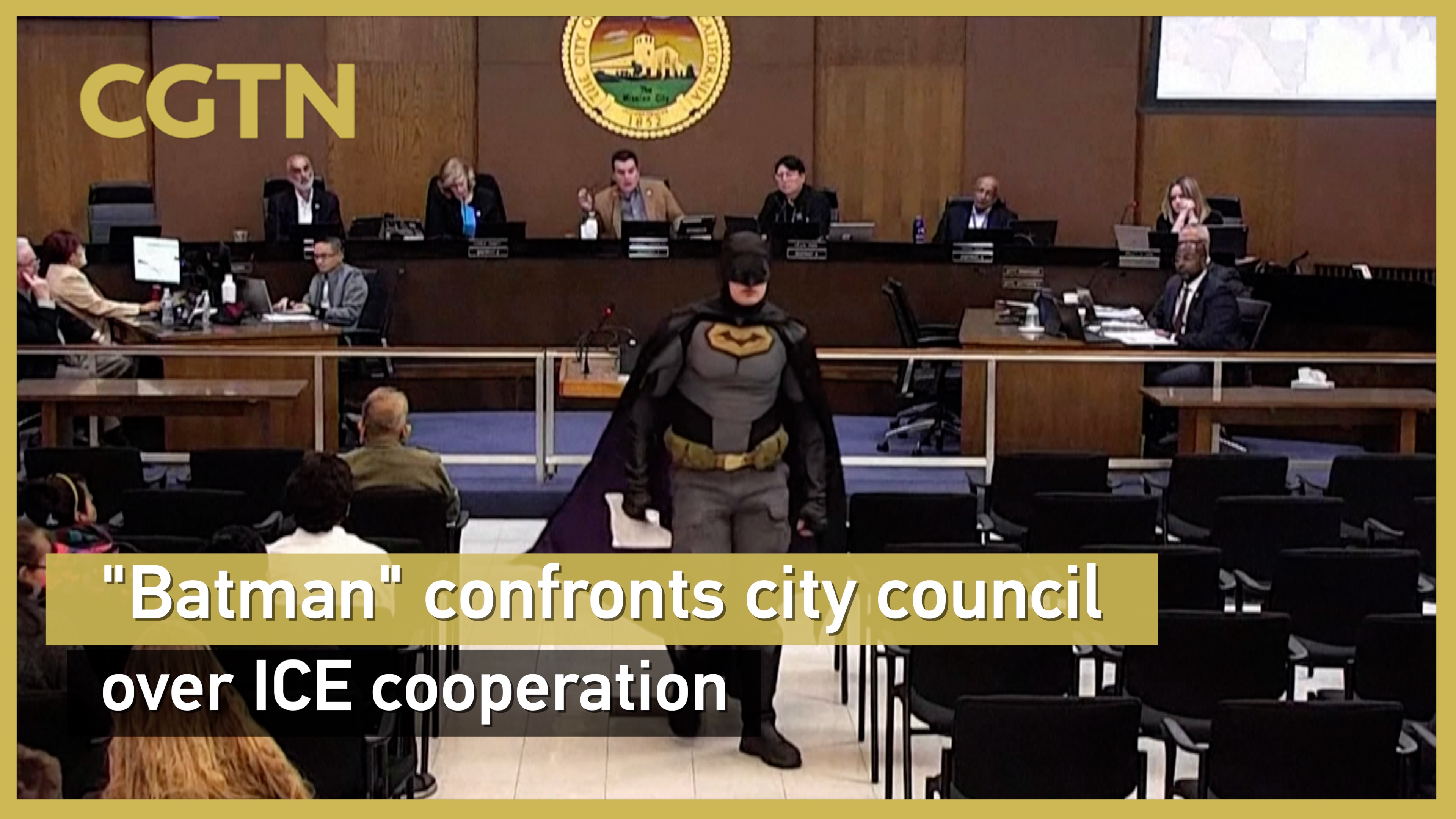 'Batman' confronts city council over ICE cooperation