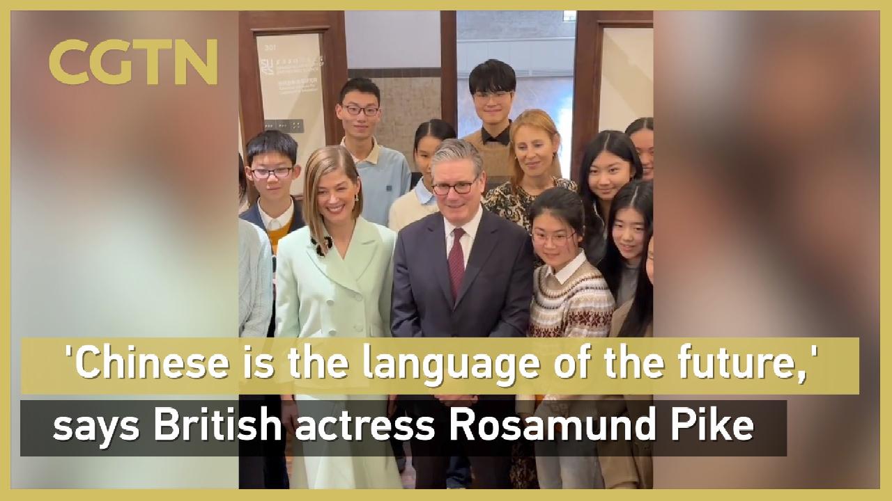 'Chinese is the language of the future,' says British actress Rosamund Pike