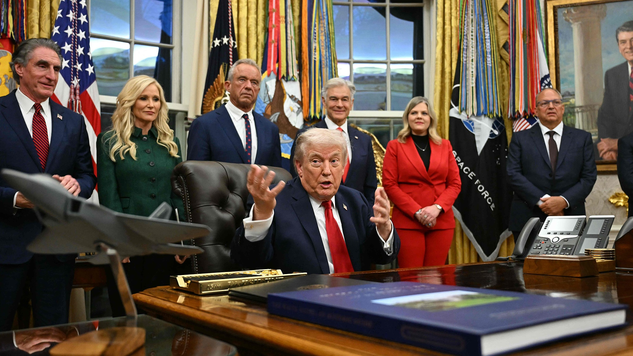 U.S. President Donald Trump signs the 