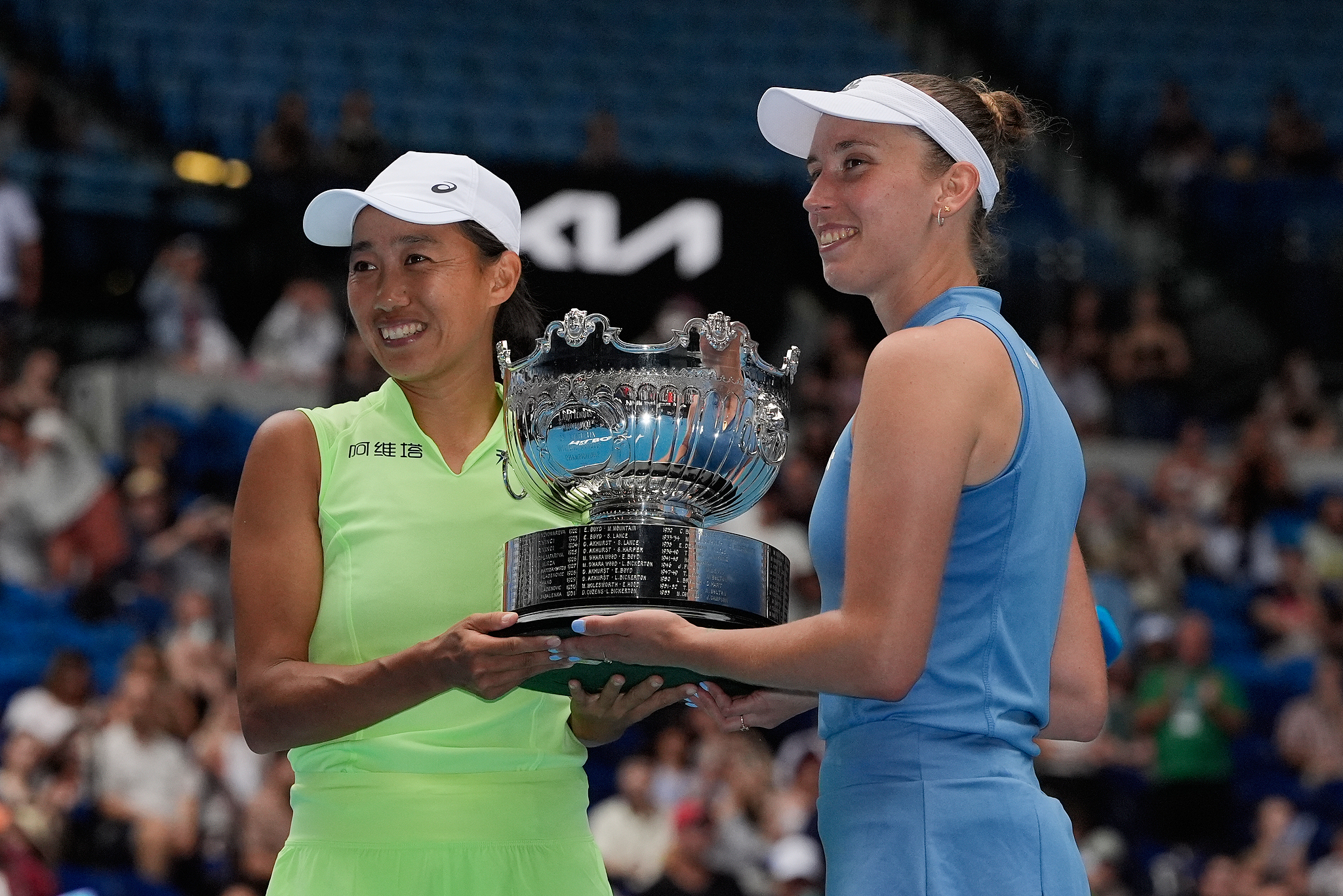Zhang Shuai (L) of China and Elise Mertens of Belgium pose with their trophy after defeating Anna Danilina of Kazakhstan and Aleksandra Krunic of Serbia in the women's doubles final at the Australian Open in Melbourne, Australia, Jan. 31, 2026. /VCG