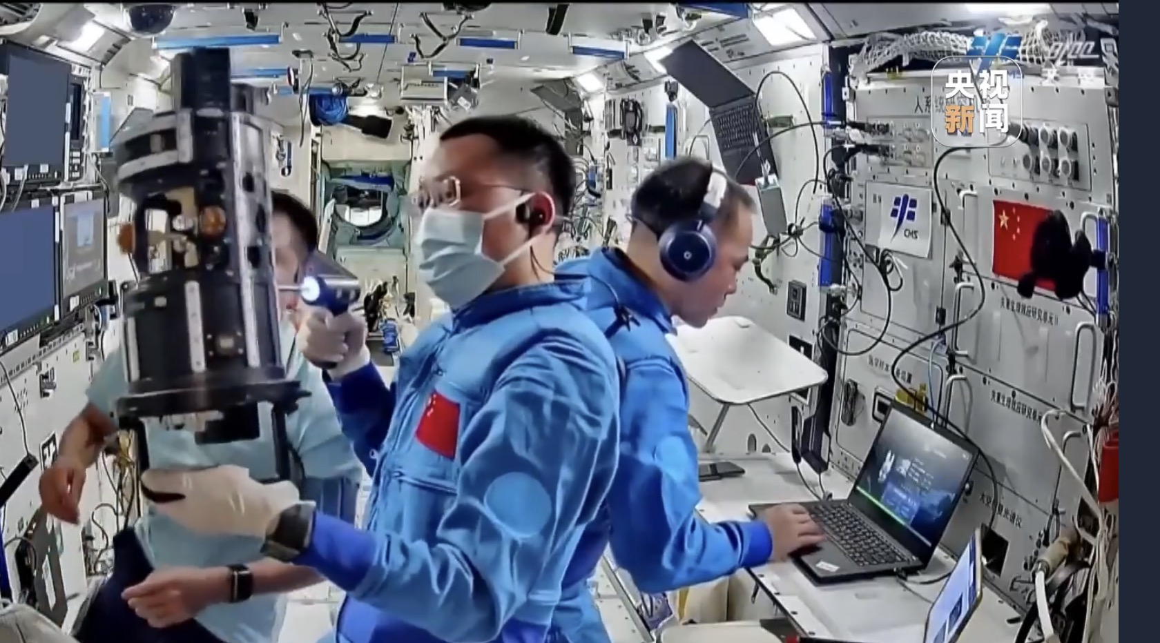 China's Shenzhou-21 astronauts conduct sample cleanup and replacement on multiple experiment racks. /CMG